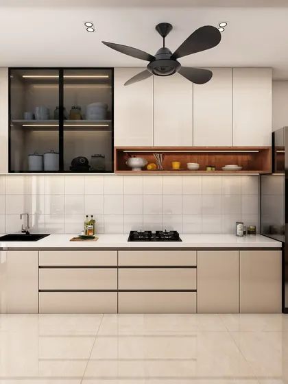 This shot shows the main work area with the sink and hob, demonstrating a practical and ergonomic layout.