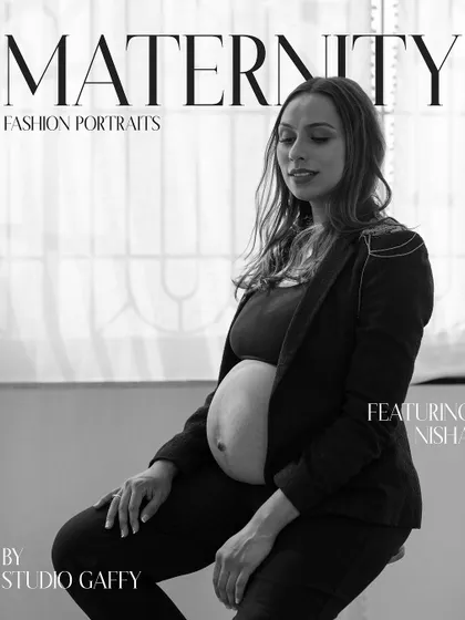 The same powerful maternity portrait, reimagined in classic black and white. This version emphasizes the form, emotion, and quiet confidence of the moment, turning a fashion shot into a piece of timeless art.
