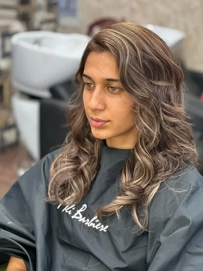 Color and confidence. A transformation from black to a beautiful, dimensional brunette.
