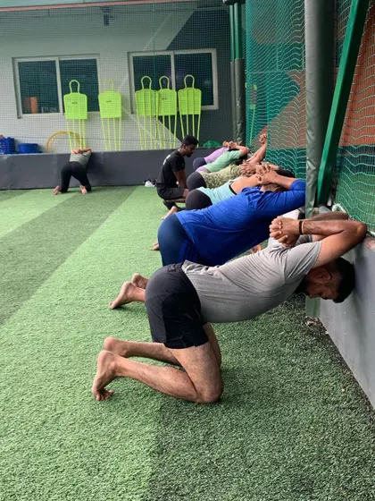 Mobility and flexibility are just as important as strength. We incorporate stretches like these to improve thoracic spine rotation, a key component of a fluid golf swing.