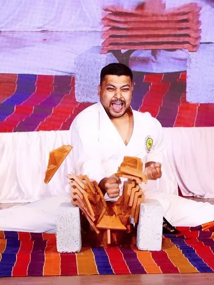 Tameshiwari, or the art of breaking, is the ultimate test of focus and power. This is a demonstration of breaking multiple tiles with a single strike while maintaining a full split, channeling energy into a single point.