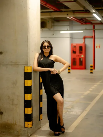 A duplicate of image 185, this creative shot in a parking garage has a moody and cinematic quality.