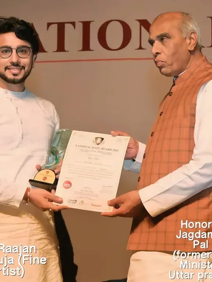 Receiving the National Icon Award 2023 in the 'Emerging Fine Artist' category from the Honorable Jagdambika Pal ji, former Chief Minister of Uttar Pradesh.