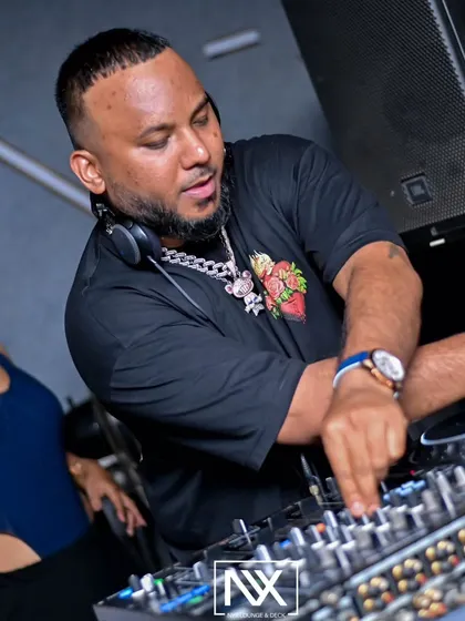 In the zone, mixing tracks for the party people at NYX Lounge in Guwahati. I feed off the crowd's energy.