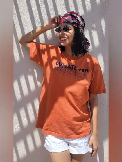 My favorite color is sunrise. A simple, sunny day look with an orange tee, white shorts, and a bandana to keep things cool and stylish.