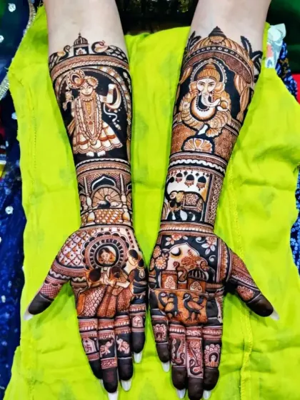 A grand bridal design featuring multiple portraits. It includes Lord Ganesha, Shrinathji, and a bride and groom, making it a masterpiece of devotional and bridal art.