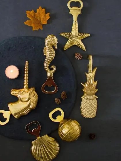 These quirky brass bottle openers are a practical and stylish favor that guests will love. I offer a variety of fun shapes, including a unicorn, seahorse, pineapple, and starfish.