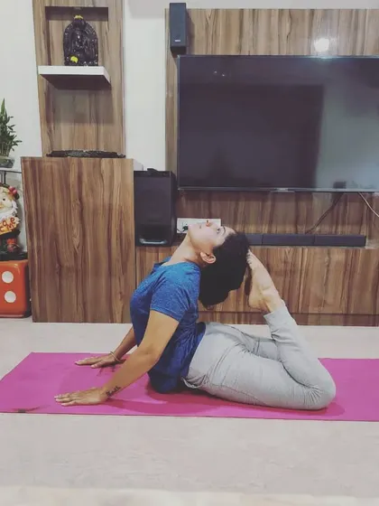 "Determine that the thing can and shall be done and then find the way." A moment from my own practice, working on Rajakapotasana (King Pigeon Pose), a deep backbend that requires patience and determination.