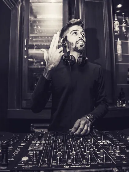 Ready for a massive weekend of gigs. This pose shows the confidence and energy I bring to every performance, whether it's a wedding or a club night.