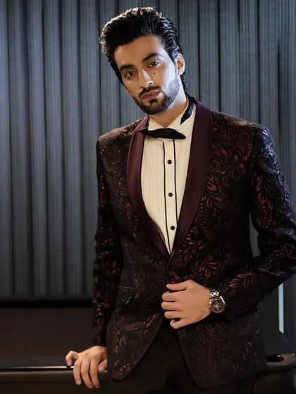 The patterned tuxedo jacket is a testament to our belief in using rich textures and fabrics to create statement pieces that are both timeless and contemporary.