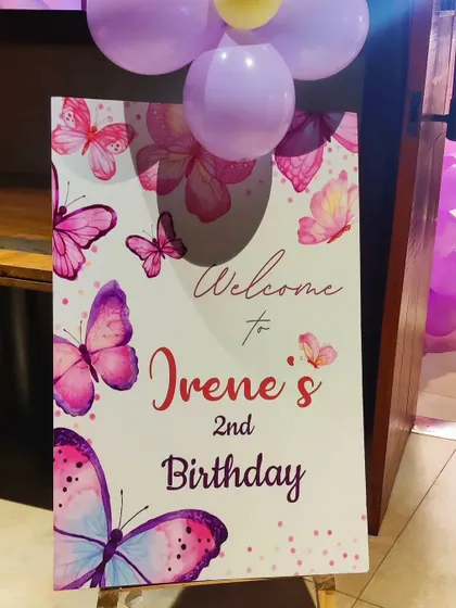 A personalized welcome sign for Irene's 2nd birthday, featuring a pretty butterfly design.