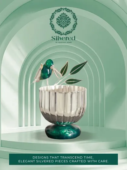 A silvered bowl with malachite stone and a hummingbird motif. This piece from my Silvered Collection reinvents gifting with luxury and elegance, creating designs that transcend time.