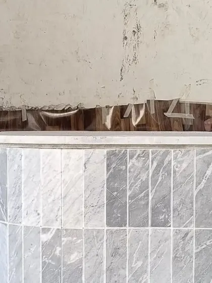 A close-up of the craftsmanship involved in the verandah bar. We work closely with skilled craftspeople to ensure every detail, from the curve of the counter to the fit of each tile, is executed perfectly.
