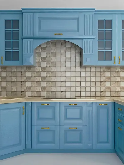 A classic kitchen design in a beautiful periwinkle blue, featuring traditional cabinet fronts, glass doors, and elegant gold handles.