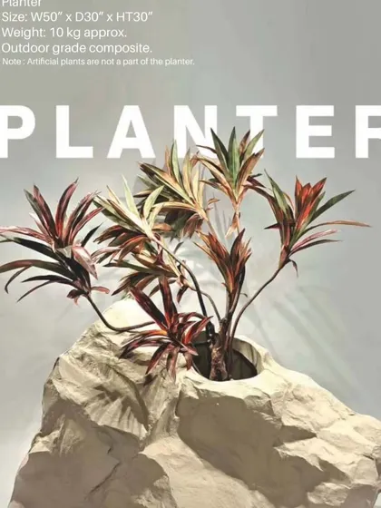 A truly unique piece from our collection. This planter is designed to look like a natural rock formation, seamlessly blending art and nature.
