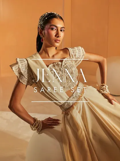 My Jenna Saree Set gives a traditional concept an edgy, modern twist. It features a gorgeous embroidered blouse with structured shoulders and a pre-draped skirt secured with a highly embellished belt.