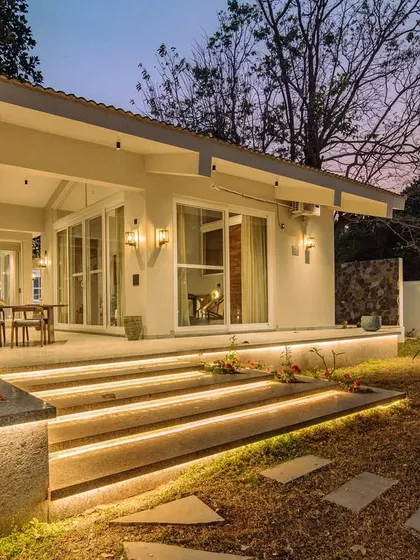 The illuminated steps at the Amberle farmhouse are one of my favorite features. This design element is both practical and beautiful, guiding the way while adding a touch of modern magic to the rustic landscape.