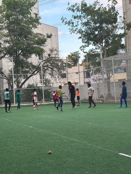 Teamwork in action! Kids learn to pass, communicate, and work together to achieve a common goal during a practice match.