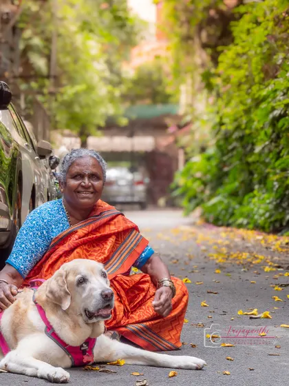A senior dog enjoying a peaceful moment with a beloved family member. These intergenerational photos are incredibly special.