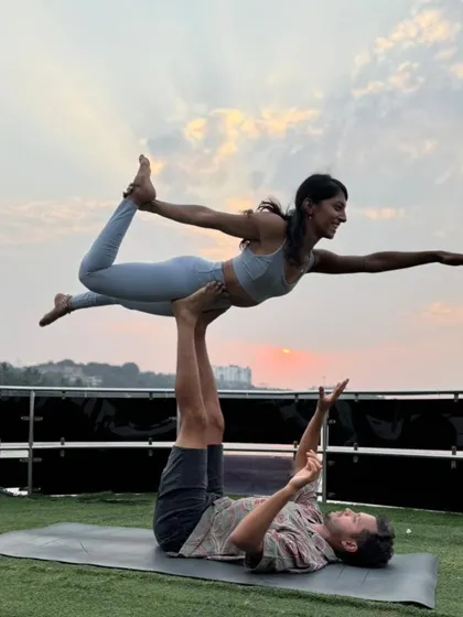 Another angle of our yacht Acro Yoga session, this time with the sunset in the background. The balance of strength and surrender is what makes this practice so special.