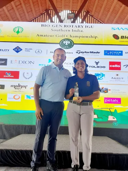 Aahana Kashyap receiving her trophy. This was her first podium finish on the main tour and a result of her incredible work ethic.