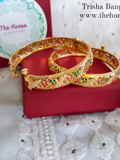 The restocked 'Trisha' bangles. These sleek bangles feature a beautiful multi-coloured stone design.
