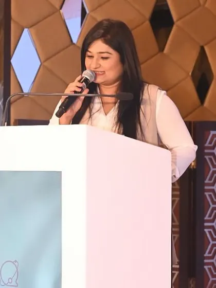 A candid moment of interaction while hosting the 'Quoraverse' summit. Connecting with the audience is what I do best.