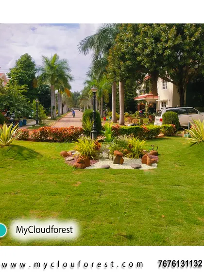 This community space features a large, open lawn with sculpted garden islands. This approach breaks up the space and adds visual interest while maintaining plenty of open area for recreation.