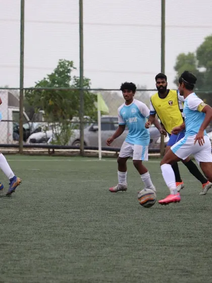 A training game in progress, with players focused on possession and movement. These small-sided games are perfect for improving tactical awareness.