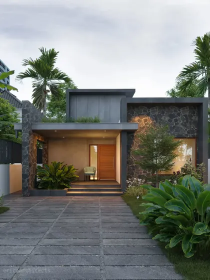 This compact single-story design makes a strong statement with bold stone-clad walls and a flat roof with integrated planters.