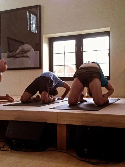 My Guruji observing practitioners in Ustrasana (Camel Pose) during the opening of the Greenwich shala. His presence and guidance have been a profound transformational force in my life.