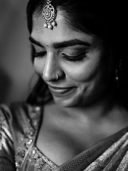 This close up black and white portrait of the bride is soft and intimate. It captures a subtle, happy expression, making for a timeless and personal photograph.