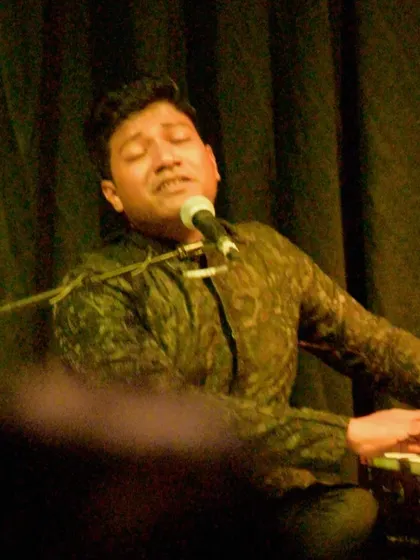 Vocalist Kaamod Subhash, lost in the melody of a ghazal. It was a mesmerizing night, and his performance was a perfect fit for our indoor baithak.