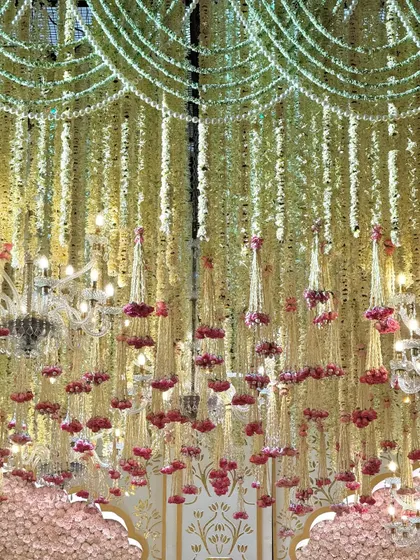 Different angles of the magnificent floral ceiling. These images showcase the density and artistry of the hanging blooms, which lend their magic to the entire venue.