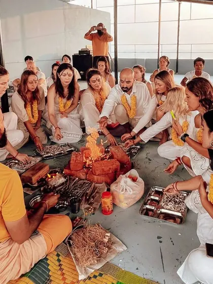 Students participate in a Havan (fire ceremony), making offerings to the fire. This powerful ritual is a cornerstone of our spiritual practices.