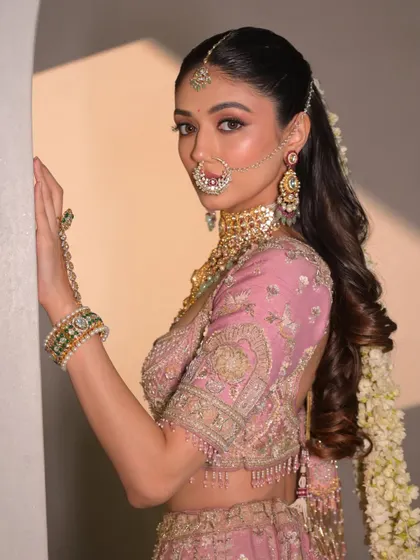 A final shot of this stunning look. The makeup is flawless, and the bride radiates confidence and grace.