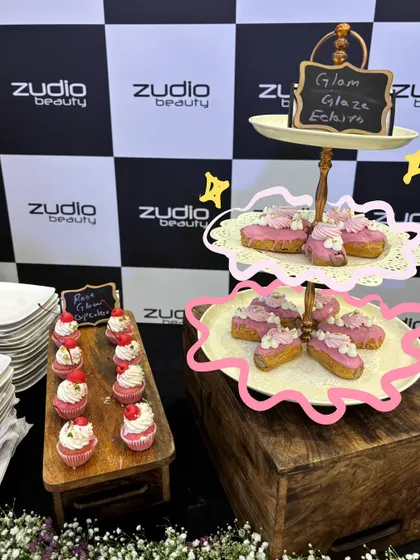 Pink desserts at a Zudio Beauty event. The doodles make them look even sweeter.