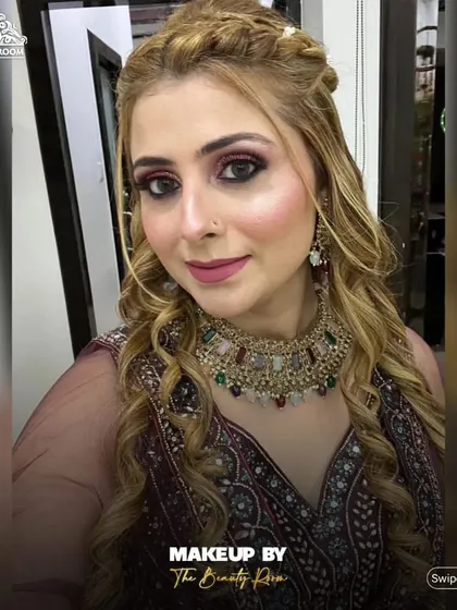 A close-up of a party makeup look. I used a blend of warm tones on the eyes and a matte pink lip to create a look that is both glamorous and wearable.