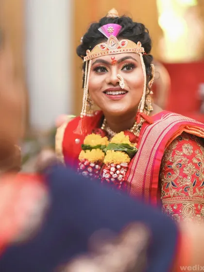 A beautiful shot of the bride looking towards her groom during the ceremony, her face full of love and happiness.