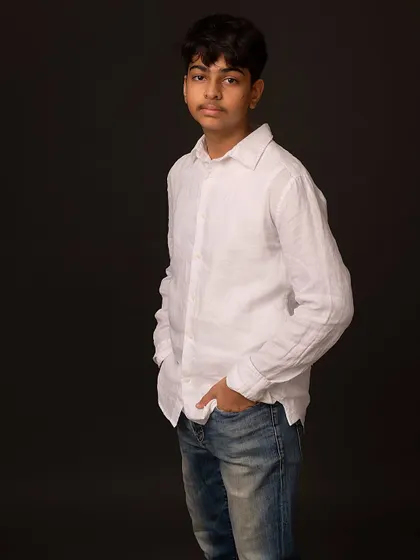 A confident standing pose. These classic portraits are perfect for marking the transition from childhood to the teen years.