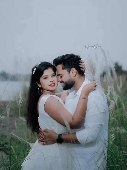 A lovely portrait where the bride-to-be looks directly at the camera. This creates a great connection with the viewer while still feeling like an intimate couple's moment.