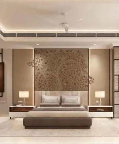 Master bedroom in the Platinum Tower project, with a custom-designed, textured headboard wall and integrated side tables.