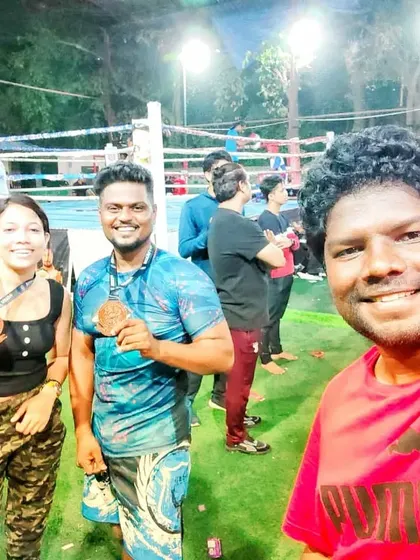 A selfie with my students after a successful day at the MMA National Championship. The camaraderie and shared experience are just as important as the medals.
