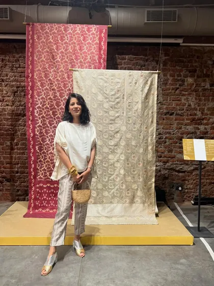 Posing against a backdrop of stunning Benarasi sarees. The rich history and craftsmanship of these textiles are always a huge source of inspiration for me.