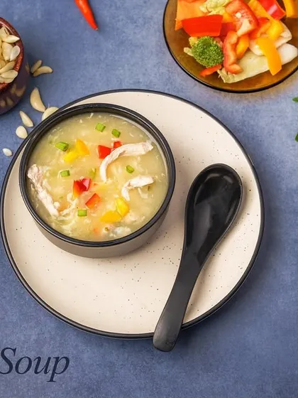 Our Delight Soup is a creamy and flavorful house special, packed with finely chopped vegetables and chicken. It's a comforting and hearty choice for any weather.