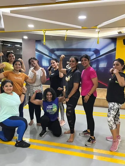 Stronger together. This photo captures the empowering spirit of our Zumba community after a particularly energetic session. The smiles and strong poses say it all.
