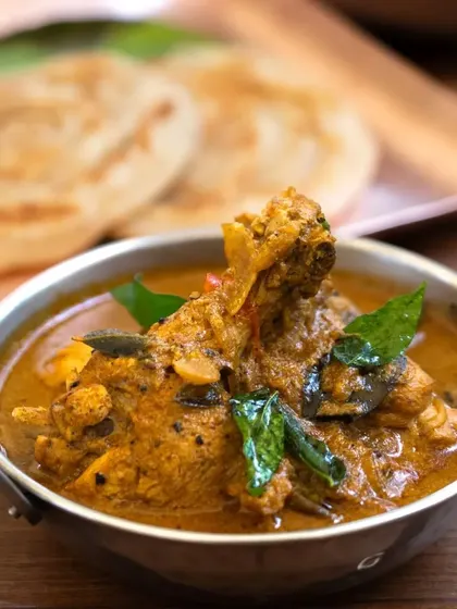A rich and aromatic chicken curry, perfect for pairing with flaky parottas. The gravy is made with a blend of traditional spices that give it a deep, complex flavour.