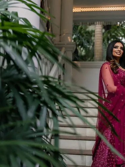 A stunning reception look at the Taj Westend. We use dramatic lighting and elegant backdrops to create sophisticated and timeless portraits for your evening events.