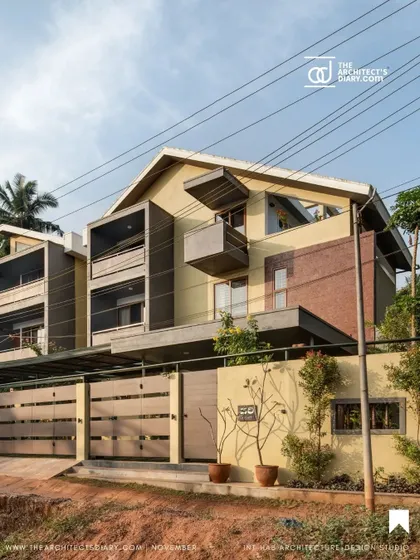 The exterior of 'Jodi Mane' features projected balconies and sloping roofs, typical of Southern homes, but with a modern interpretation. These elements are not just aesthetic; they are functional responses to the local climate.