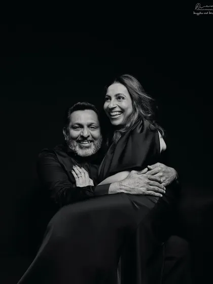 The laughter that keeps a love story going. This anniversary portrait in black and white is full of life and shared joy.